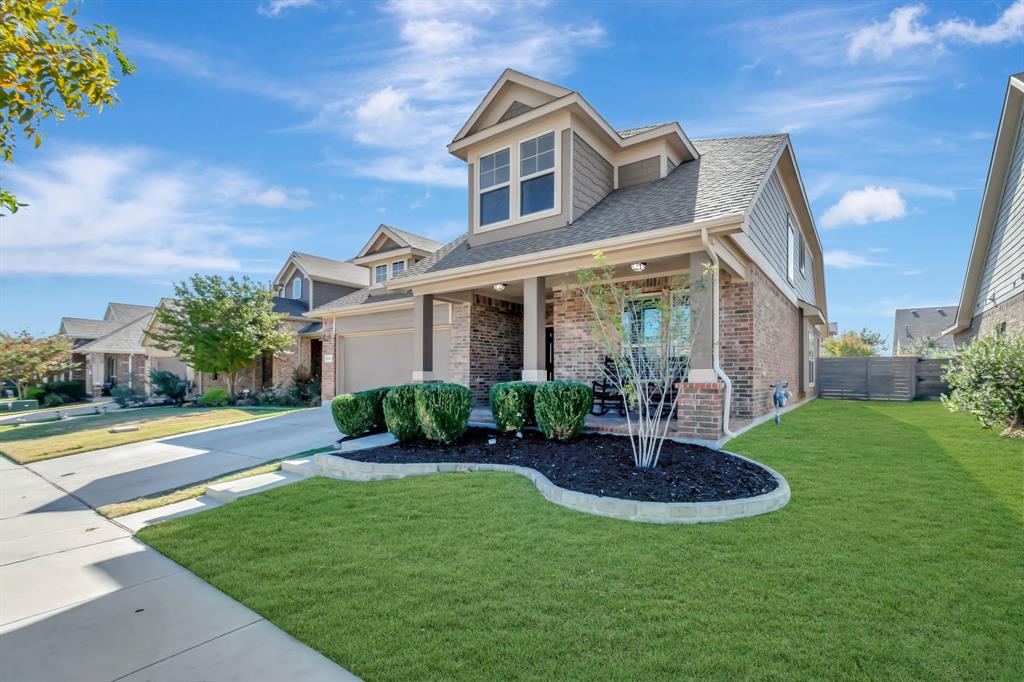 1925 Homestead Way Northlake, TX 76226 - Photo 1 of 1 a front view of a house with a yard and garage