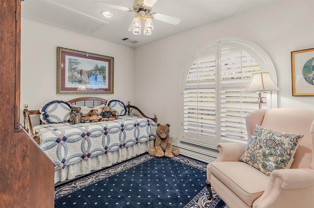 1 Willow Ridge Road Greenville, TX 75402 - Photo 26 of 38 a bedroom with furniture and a large window