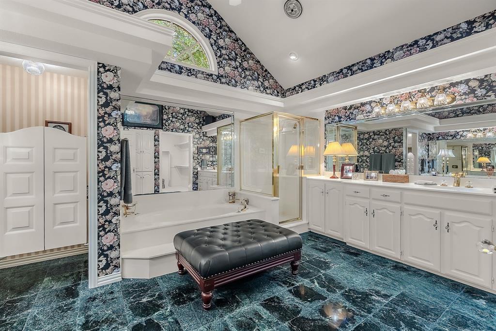 1 Willow Ridge Road Greenville, TX 75402 - Photo 37 of 38 a bathroom with a sink a mirror and a shower