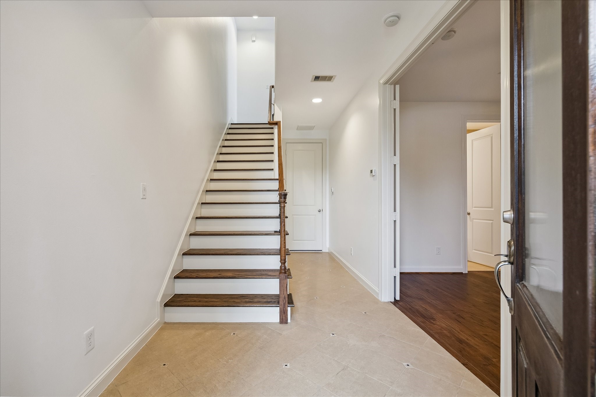 1407 Shearn Street Houston, TX 77007 - Photo 7 of 35 Stairs to second floor feature oak treads and iron railing.