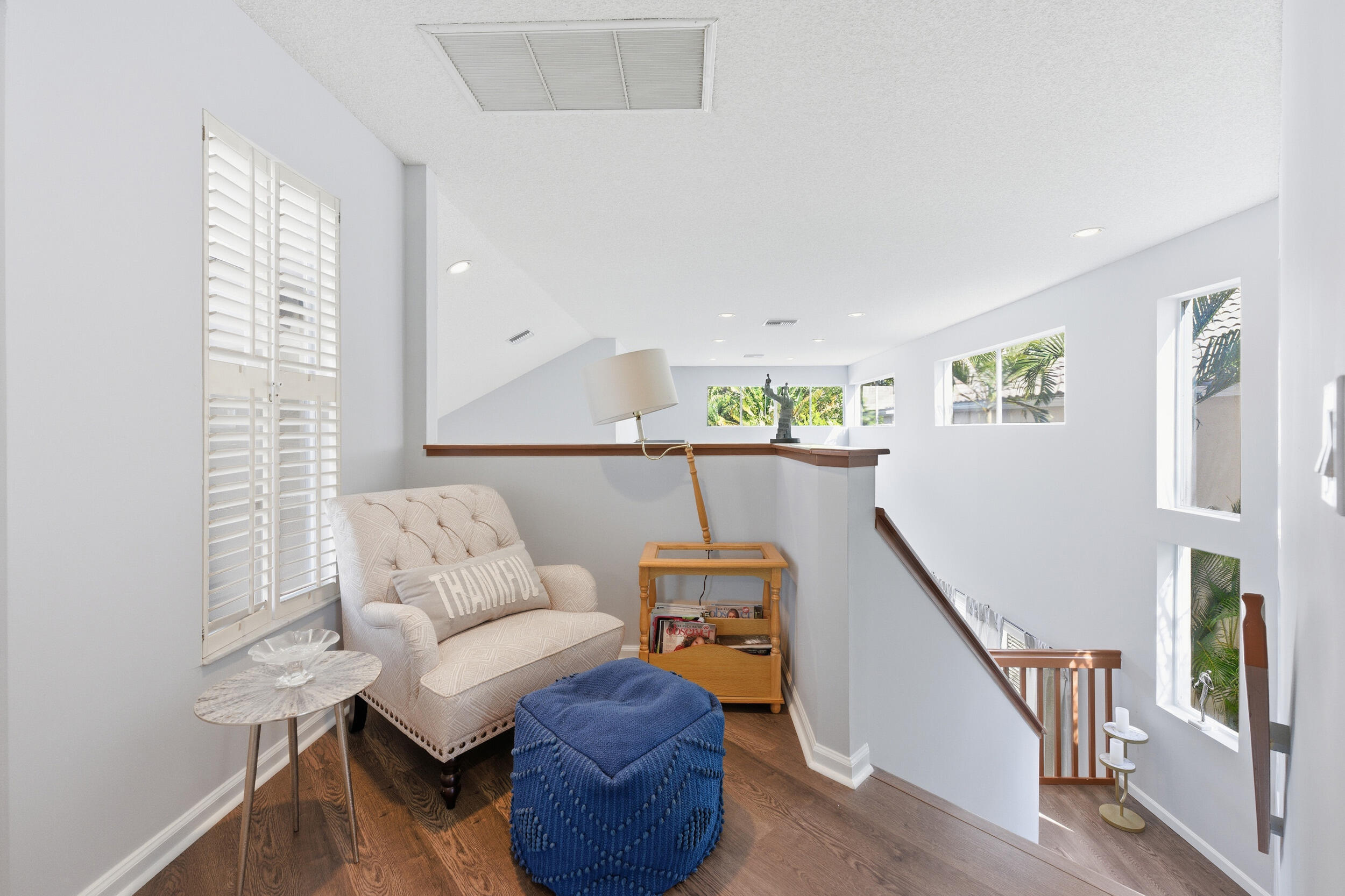 2495 Northwest 66th Drive Boca Raton, FL 33496 - Photo 29 of 74 a living room with furniture and a wooden floor