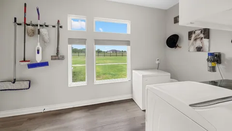a view of bathroom with dual sinks