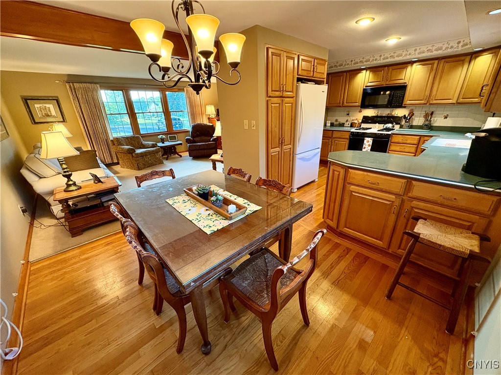 4145 Coye Road LaFayette, NY 13078 - Photo 25 of 48 View from dining to kitchen and living room