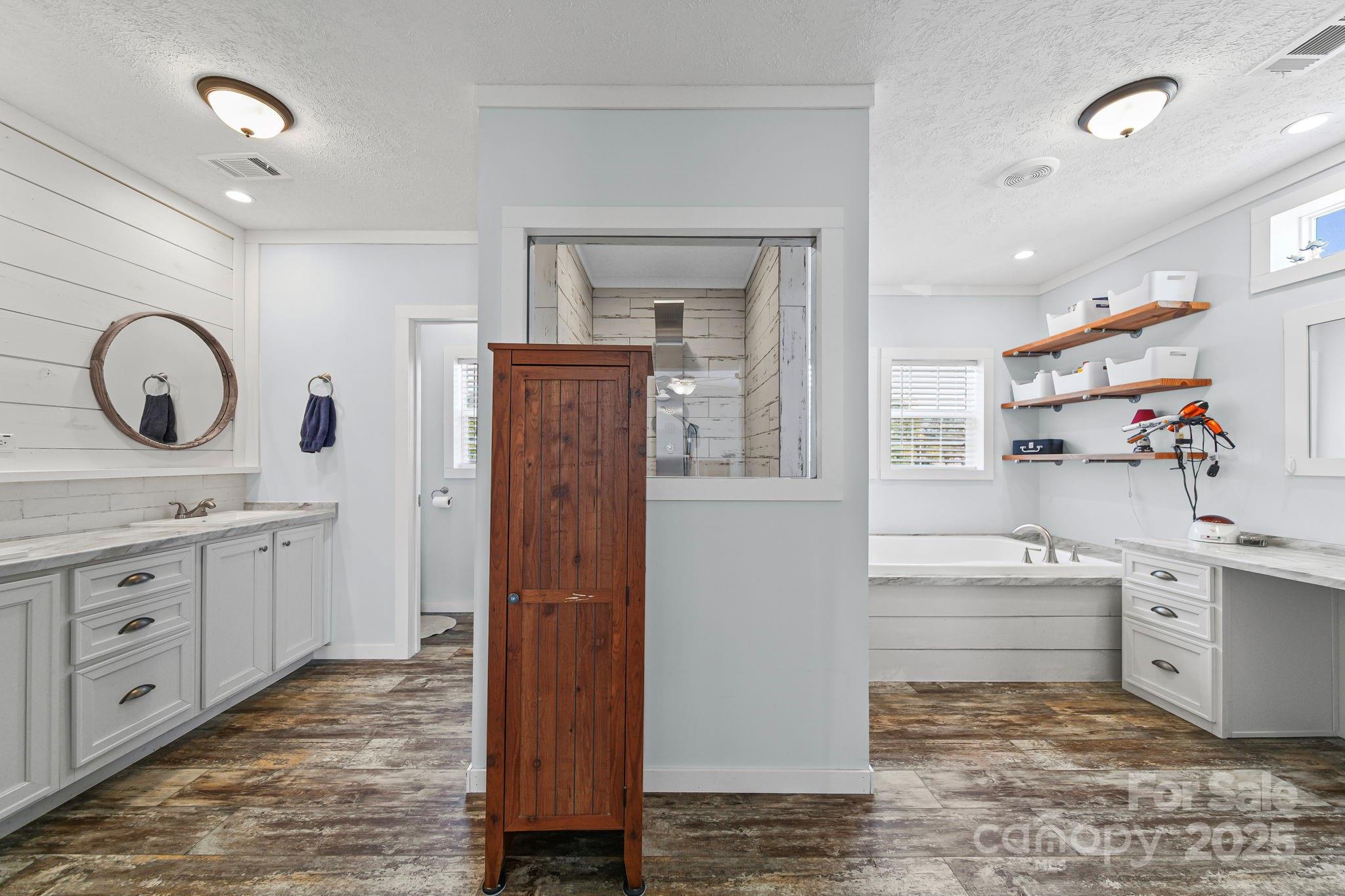 6179 Steen Road Jefferson, SC 29718 - Photo 14 of 26 a room with white cabinets and sink