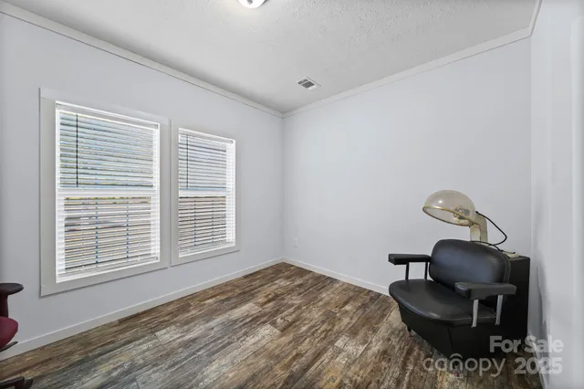 a workspace with furniture and a window