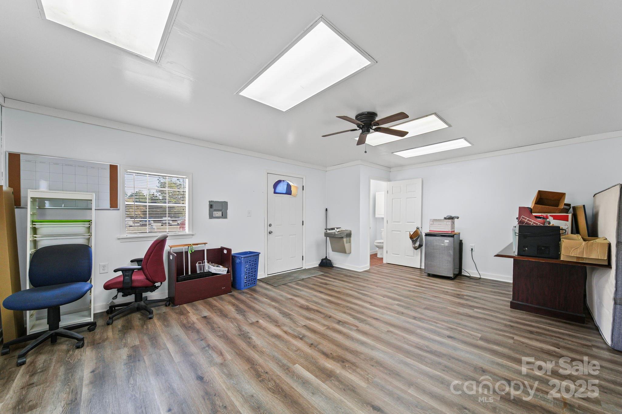 6179 Steen Road Jefferson, SC 29718 - Photo 23 of 26 a living room with furniture and a wooden floor