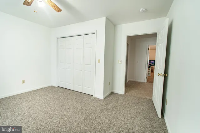 an empty room with closet