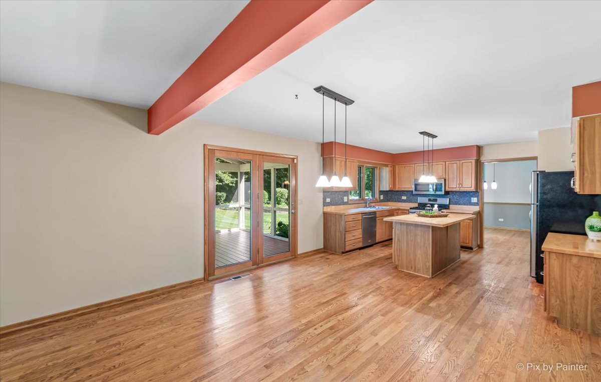 3001 Turnberry Road St. Charles, IL 60174 - Photo 14 of 46 a kitchen with a sink cabinets and wooden floor