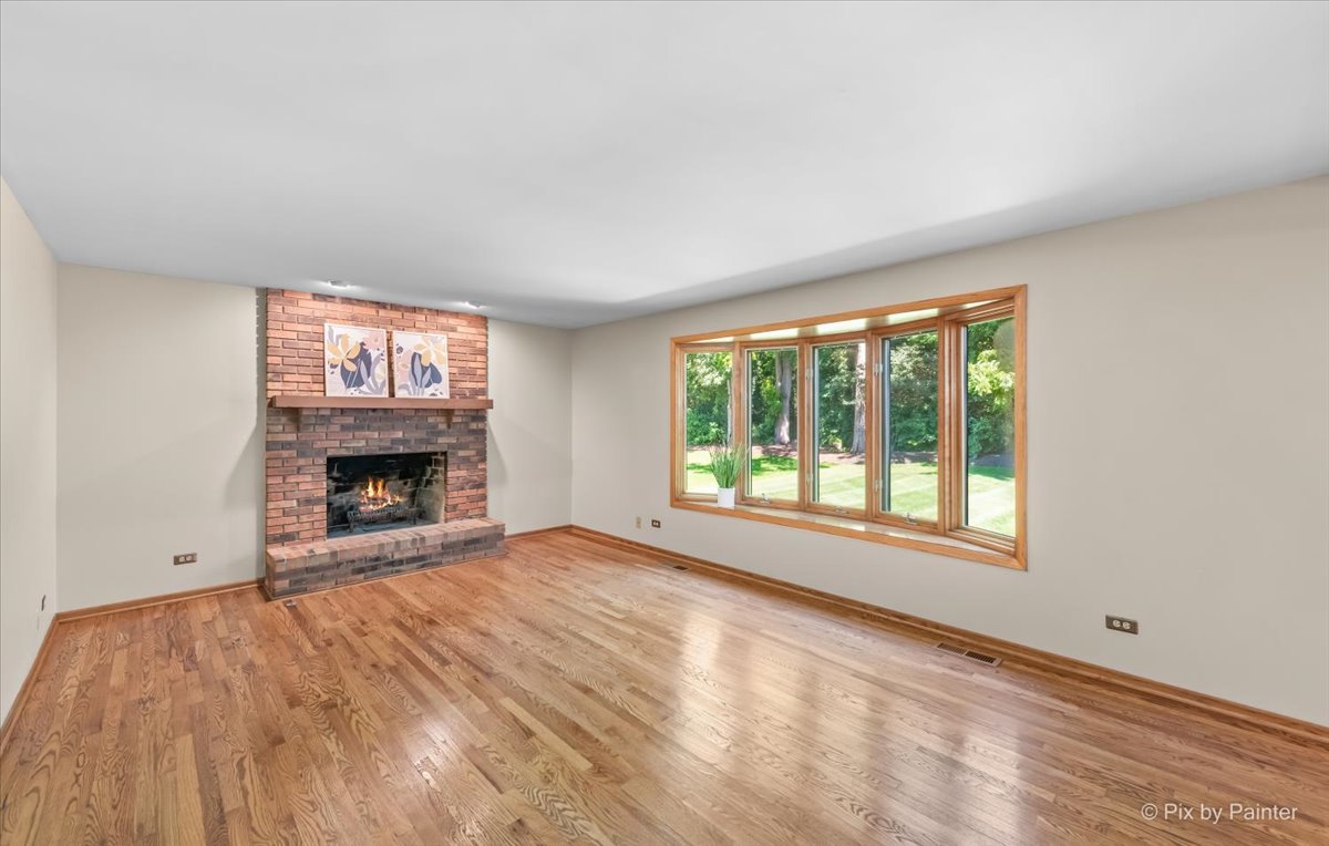 3001 Turnberry Road St. Charles, IL 60174 - Photo 15 of 46 a view of an empty room with a window and fireplace