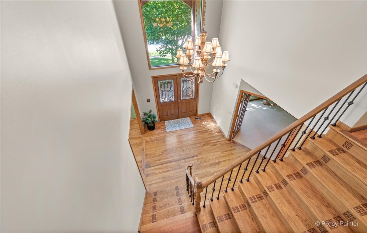 3001 Turnberry Road St. Charles, IL 60174 - Photo 22 of 46 a view of a dining room with furniture and wooden floor