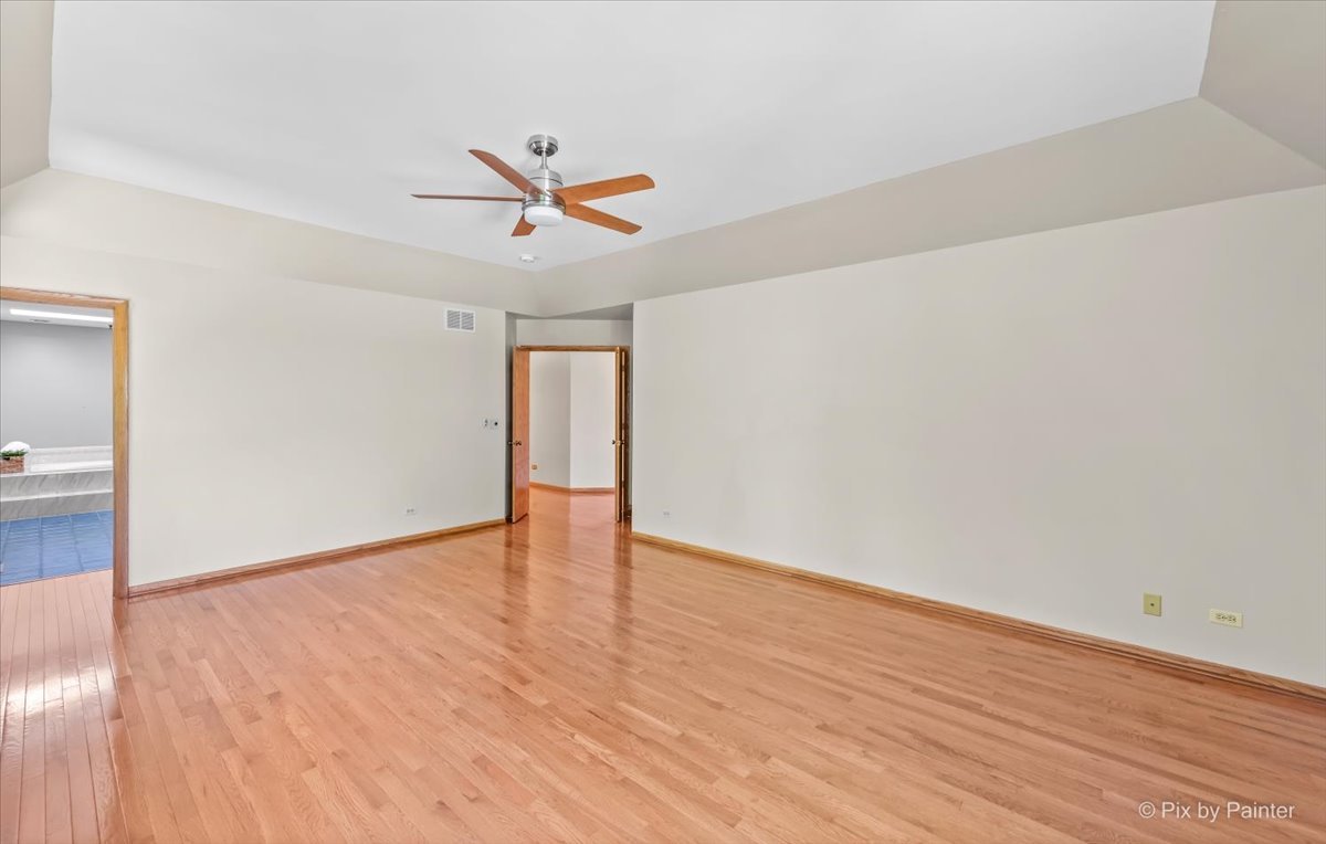 3001 Turnberry Road St. Charles, IL 60174 - Photo 25 of 46 a view of an empty room and wooden floor