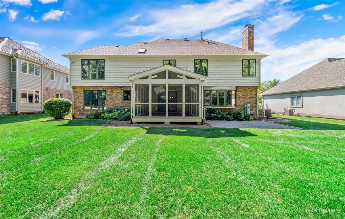 3001 Turnberry Road St. Charles, IL 60174 - Photo 45 of 46 a view of a house with a yard and plants