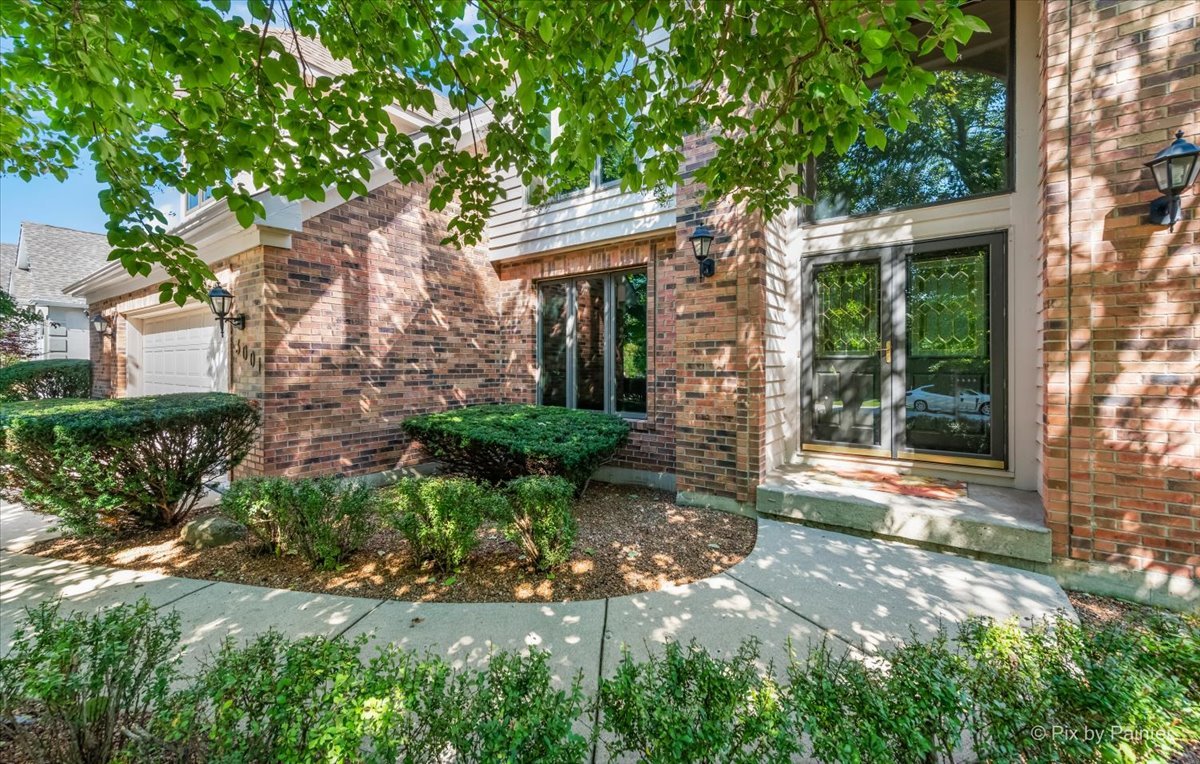 3001 Turnberry Road St. Charles, IL 60174 - Photo 5 of 46 a view of a house with brick walls and a tree