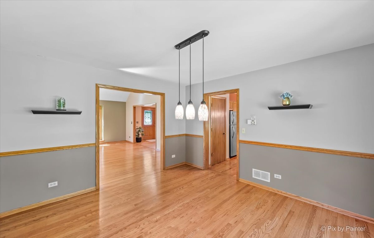 3001 Turnberry Road St. Charles, IL 60174 - Photo 10 of 46 a view of a room with wooden floor and window