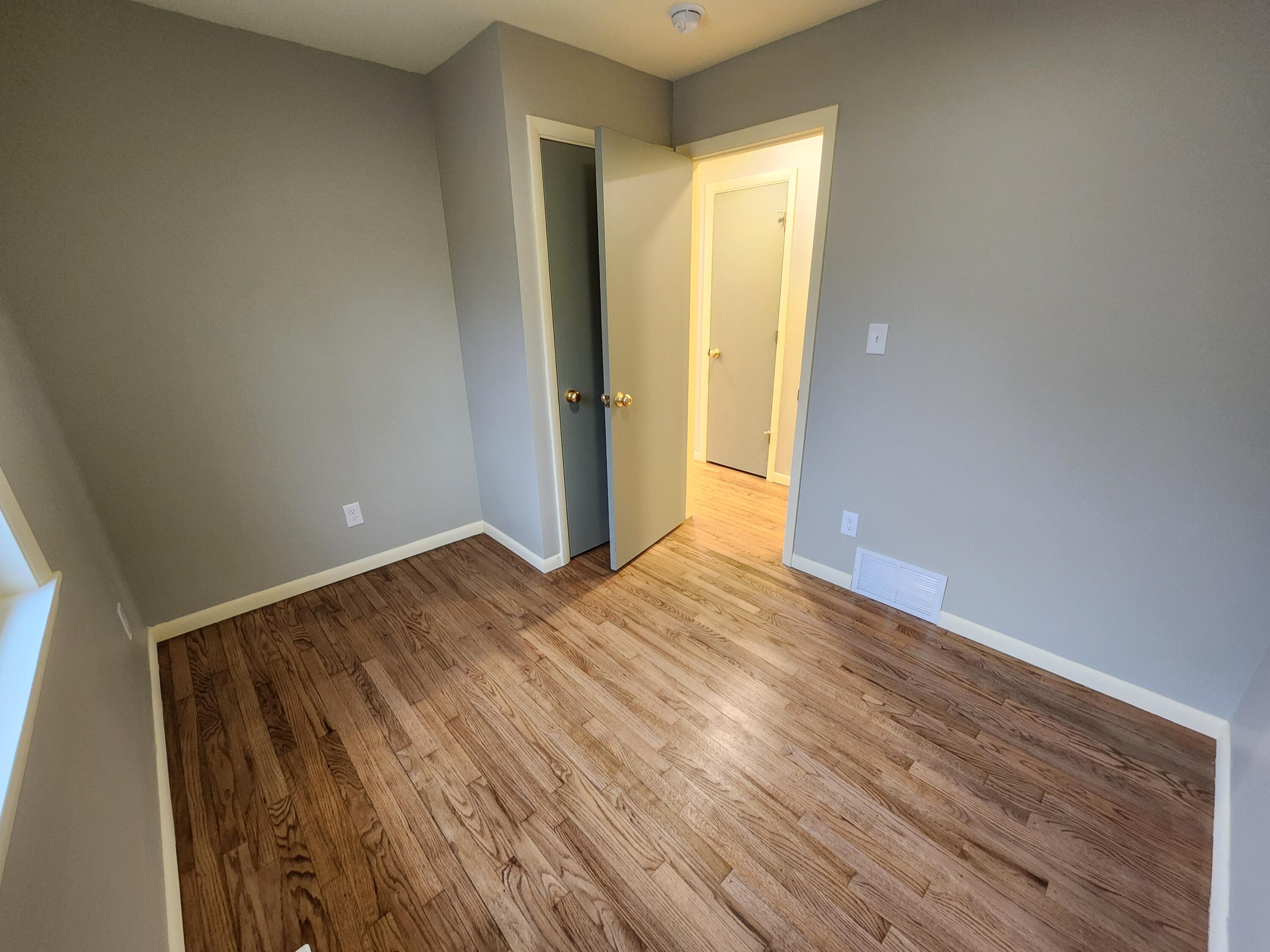 5049 Indiana Place Gary, IN 46409 - Photo 15 of 24 a view of empty room with wooden floor
