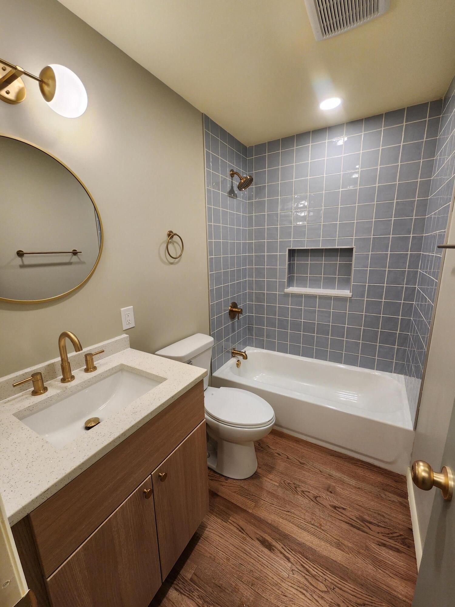 5049 Indiana Place Gary, IN 46409 - Photo 15 of 23 a bathroom with a sink a toilet and shower