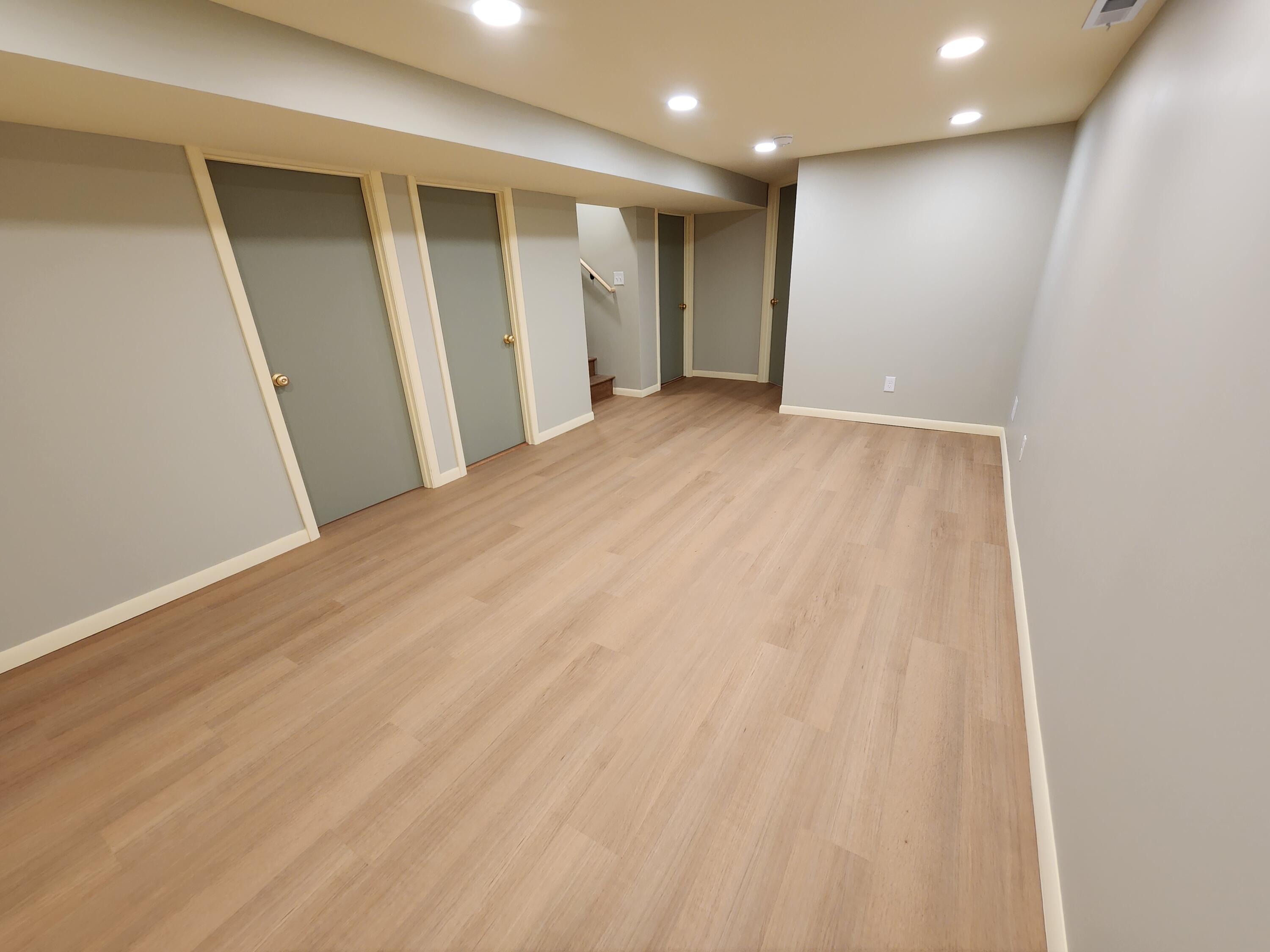 5049 Indiana Place Gary, IN 46409 - Photo 17 of 24 an empty room with wooden floor and windows