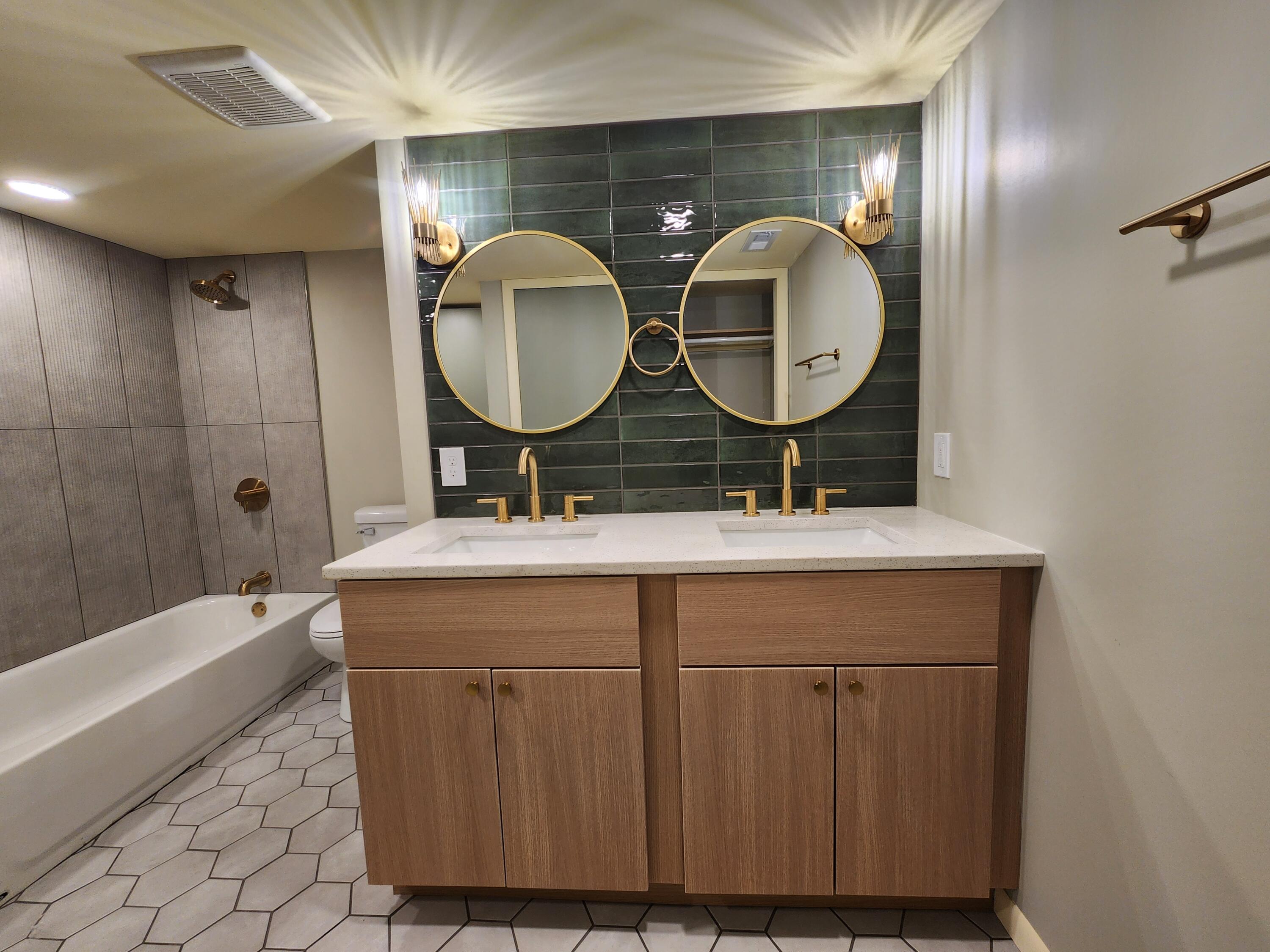 5049 Indiana Place Gary, IN 46409 - Photo 23 of 23 a bathroom with a double vanity sink and a mirror