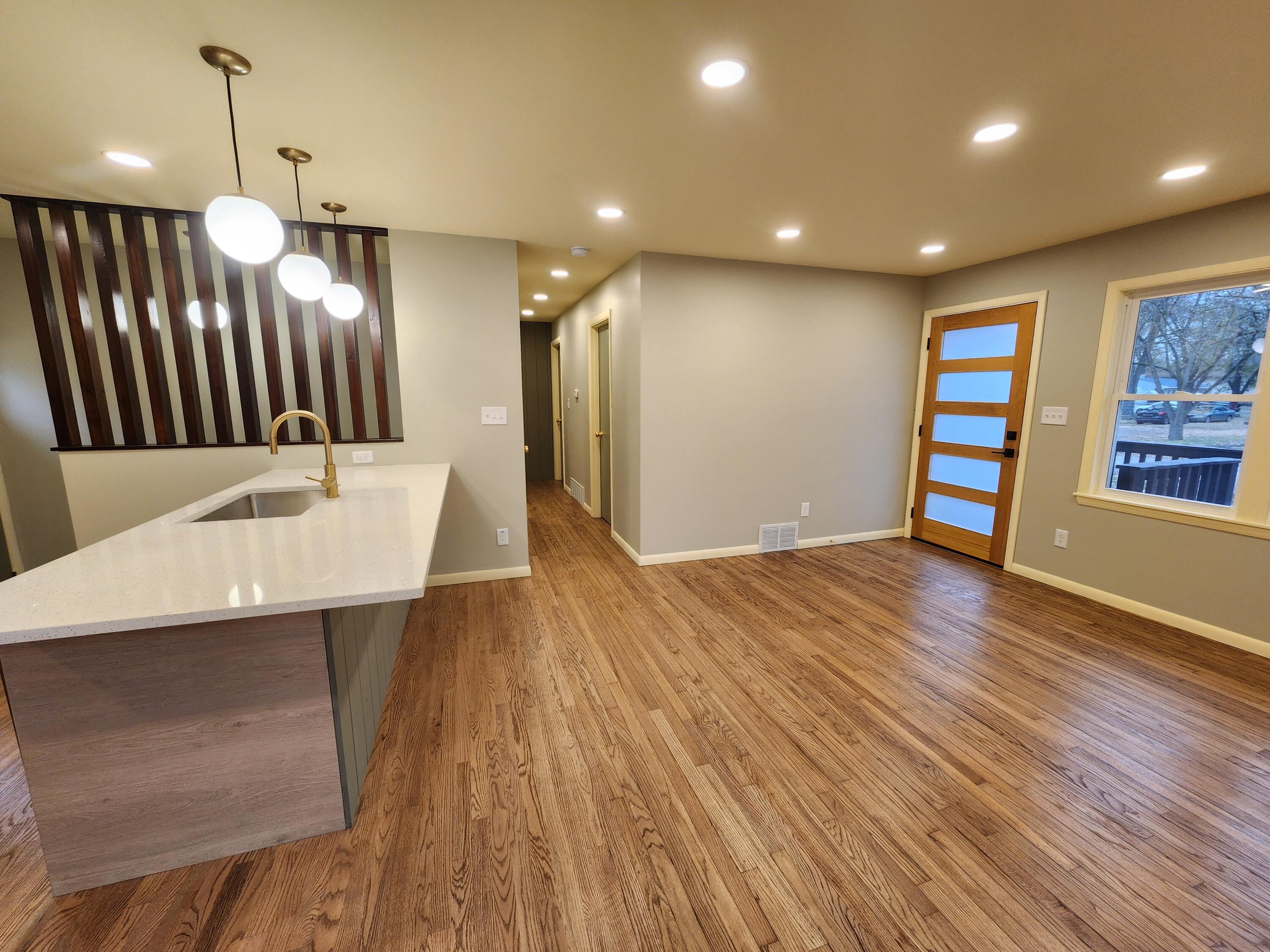 5049 Indiana Place Gary, IN 46409 - Photo 9 of 24 a view of a room with furniture and wooden floor