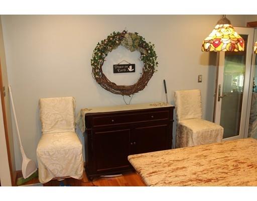 46 Manatee Road Weymouth, MA 02189 - Photo 15 of 29 a bed room with a bed mirror and a table