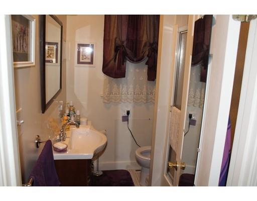 46 Manatee Road Weymouth, MA 02189 - Photo 18 of 29 a bathroom with a sink and mirror