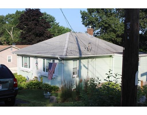 46 Manatee Road Weymouth, MA 02189 - Photo 4 of 29 a aerial view of a house with table and chairs under an umbrella