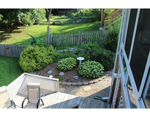 46 Manatee Road Weymouth, MA 02189 - Photo 9 of 29 a view of a backyard with seating area