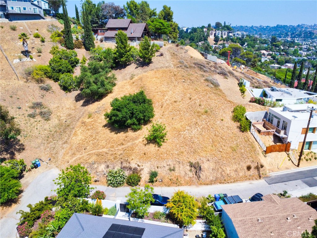 1938 Phillips Way Los Angeles, CA 90042 - Photo 22 of 22 an aerial view of a house with a yard and lake view