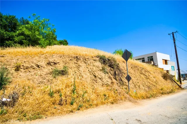 a view of a backyard of a house