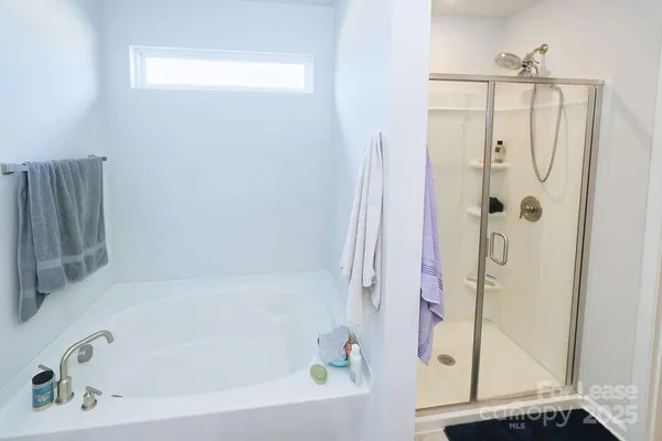 a bedroom with a bed and a closet