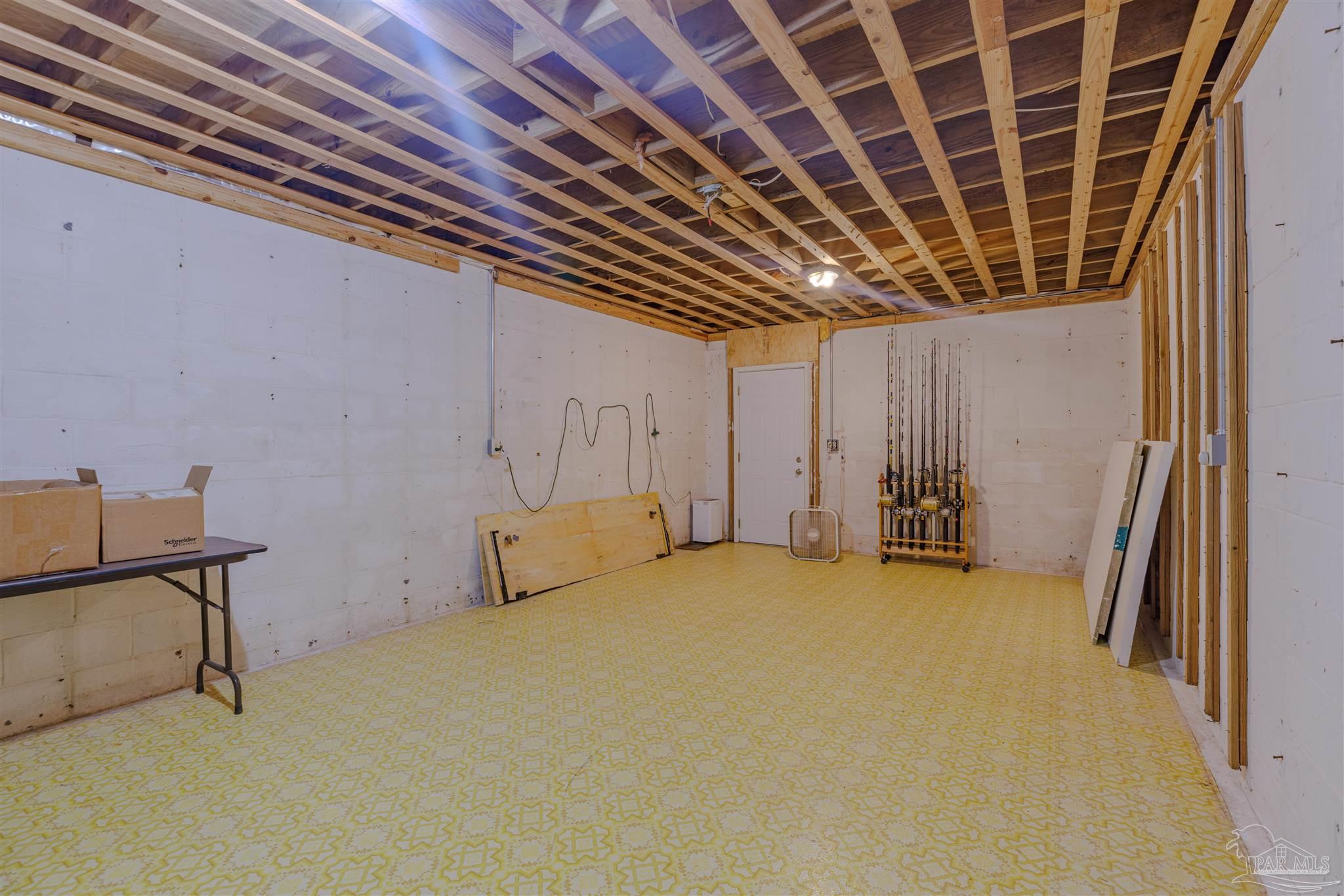5049 Guernsey Road Pace, FL 32571 - Photo 45 of 61 a view of a room with storage space