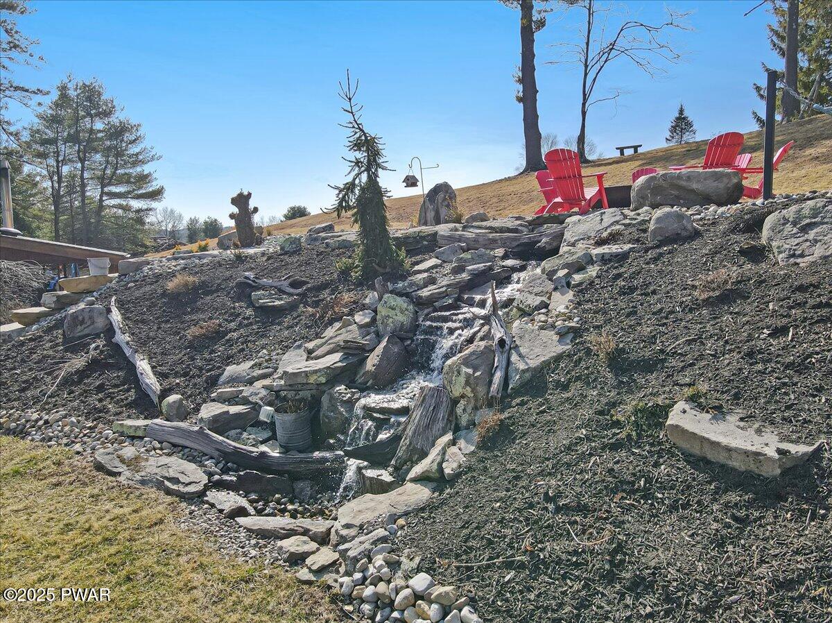 101 Knealing Road Shohola, PA 18458 - Photo 53 of 64 Waterfall / firepit