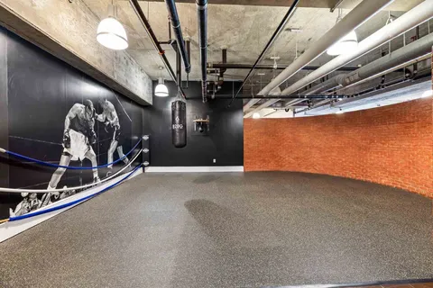 a view of room with gym equipment