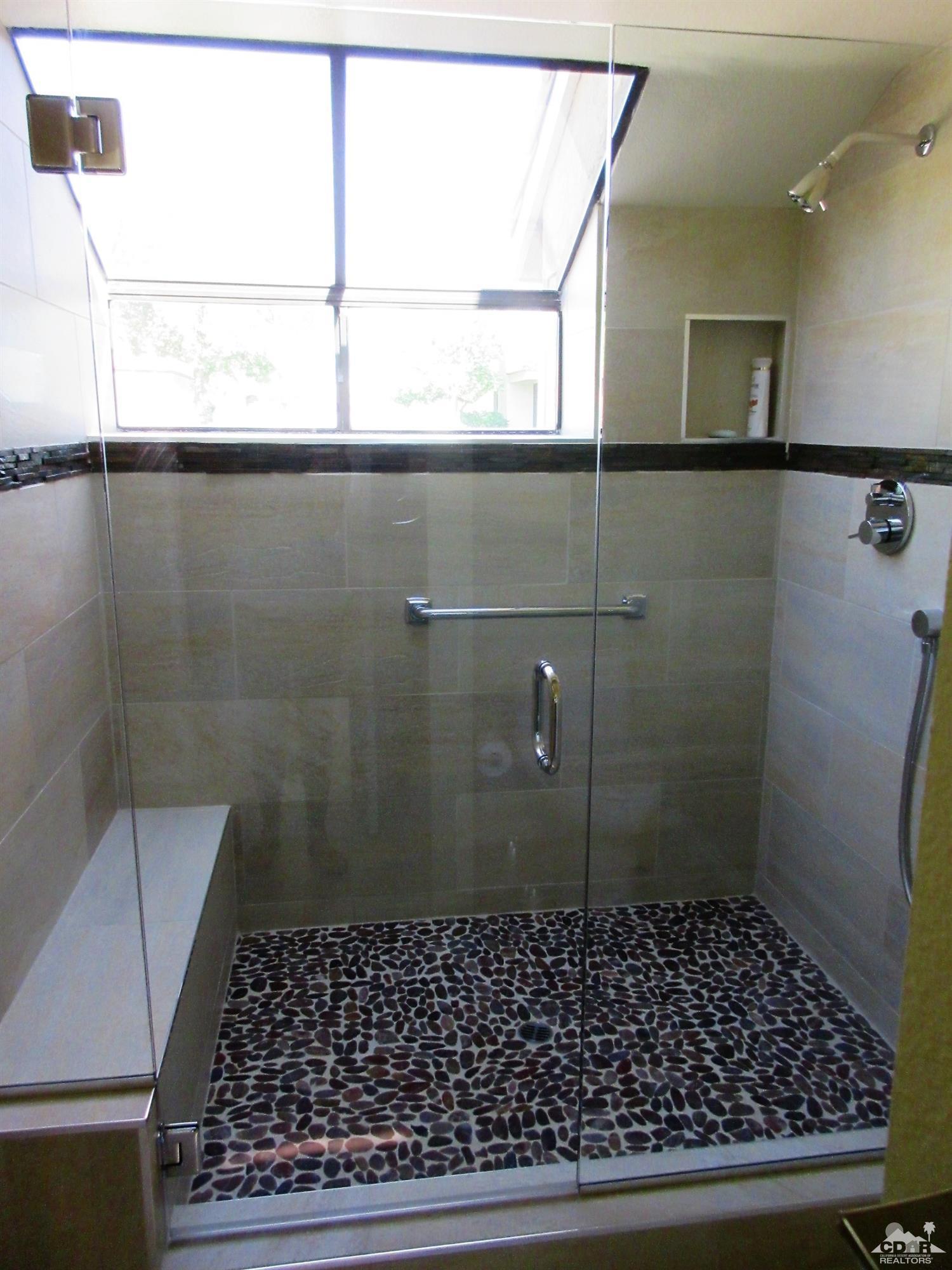 1 Pacifica Lane Palm Desert, CA 92260 - Photo 18 of 22 a bathroom with a shower