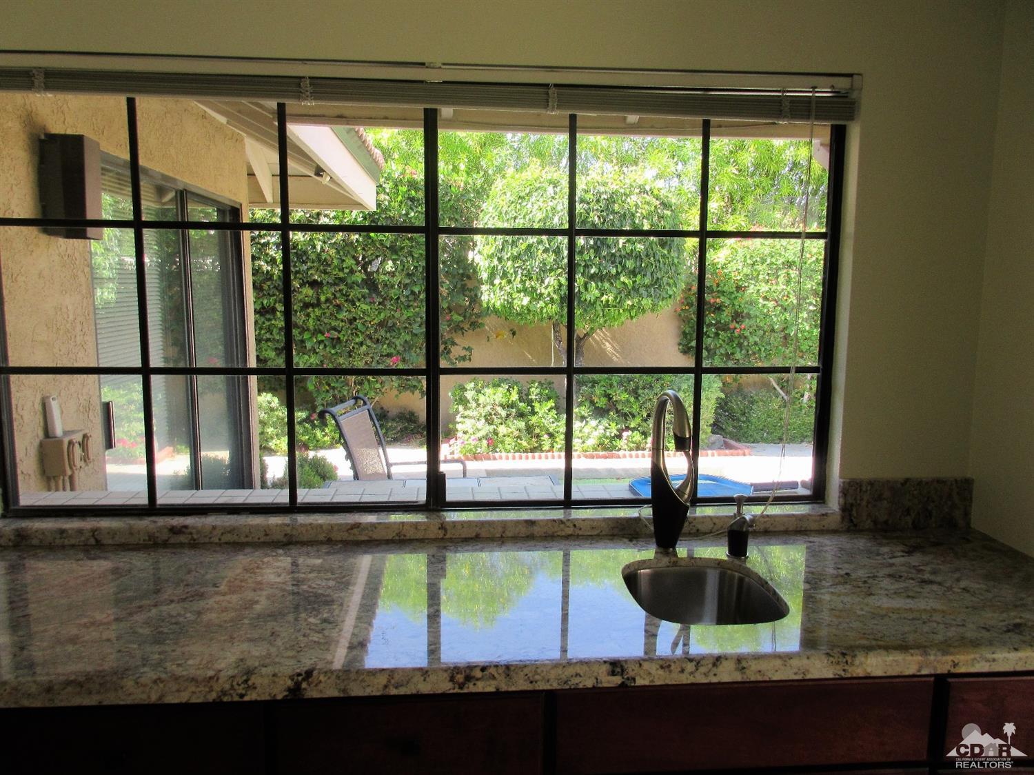 1 Pacifica Lane Palm Desert, CA 92260 - Photo 6 of 22 a view of a lake view