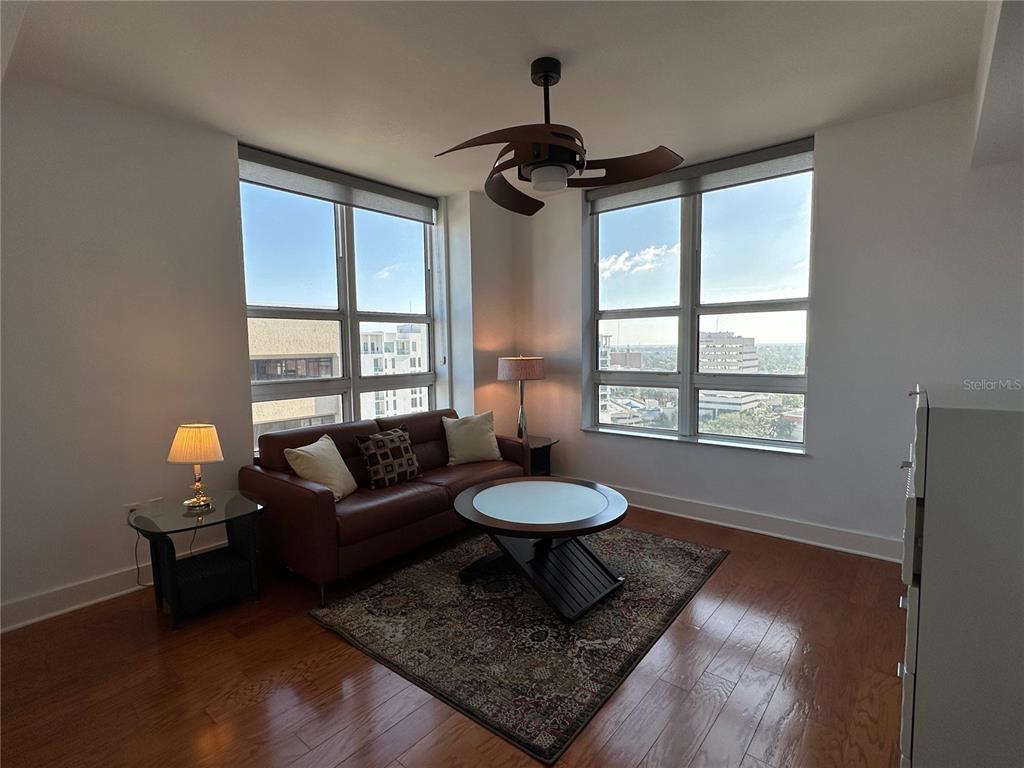 1350 Main Street, Unit 1401 Sarasota, FL 34236 - Photo 24 of 69 a living room with furniture and a window