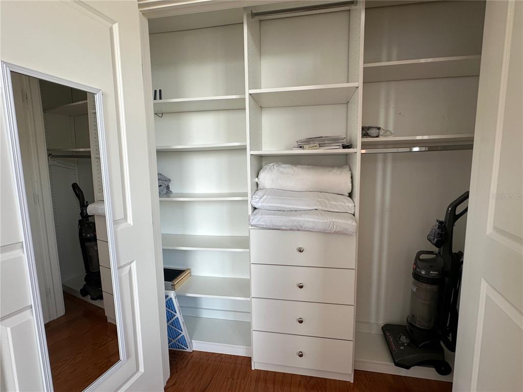1350 Main Street, Unit 1401 Sarasota, FL 34236 - Photo 45 of 69 a view of walk in closet with empty racks