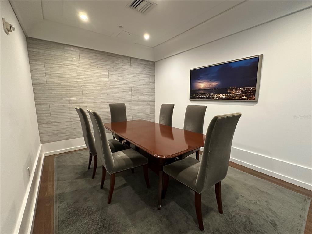 1350 Main Street, Unit 1401 Sarasota, FL 34236 - Photo 65 of 69 a view of a dining room with furniture