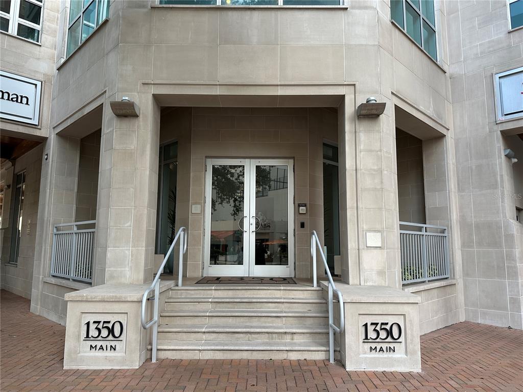 1350 Main Street, Unit 1401 Sarasota, FL 34236 - Photo 68 of 69 a front view of a building with a entrance