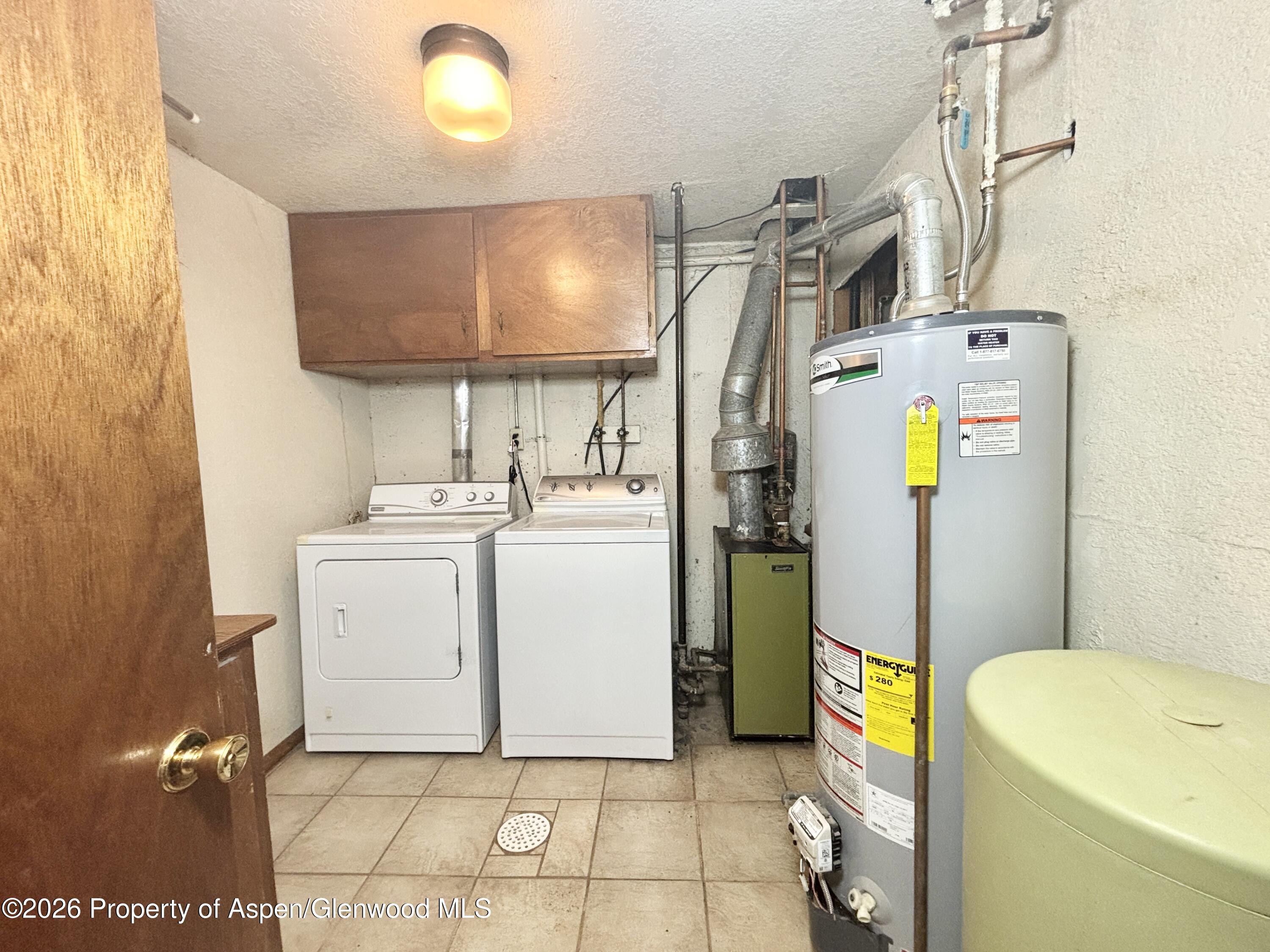 1623 West 7th Street Rifle, CO 81650 - Photo 16 of 21 a utility room with dryer and washer