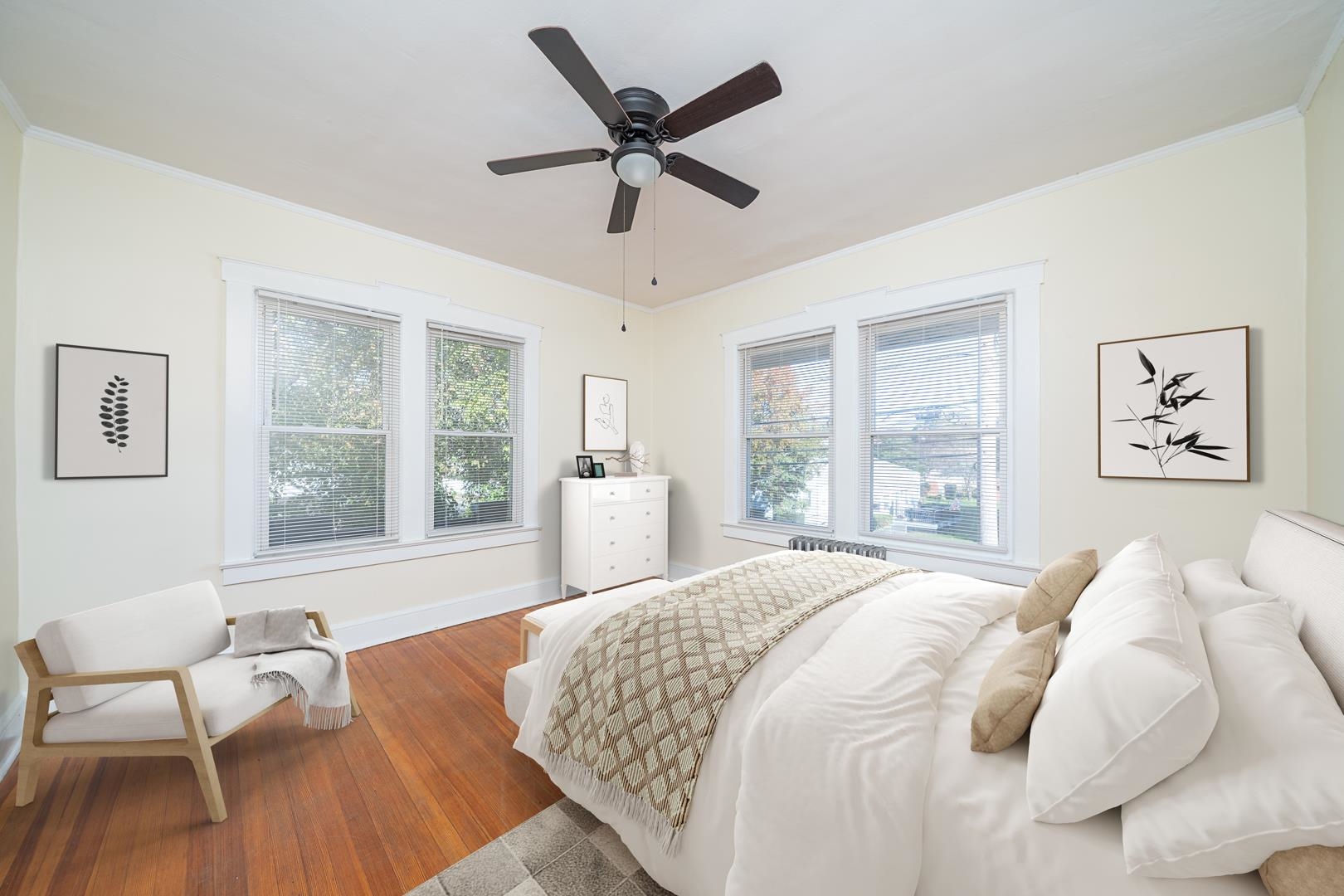 168 West Passaic Street, Unit 2 Maywood, NJ 07607 - Photo 12 of 22 a spacious bedroom with a bed a couch and a large window