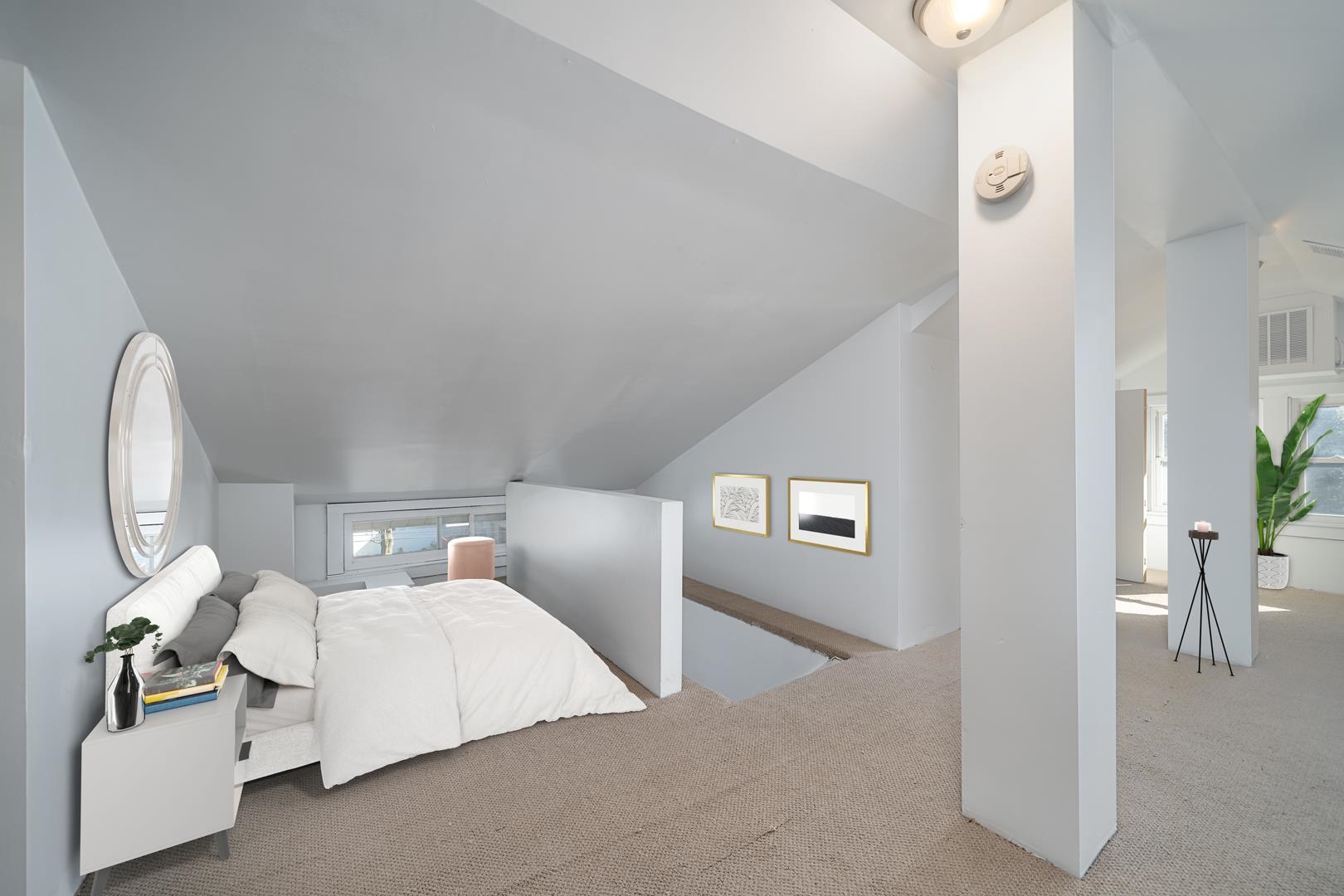 168 West Passaic Street, Unit 2 Maywood, NJ 07607 - Photo 15 of 22 a bed room with a bed and a chandelier
