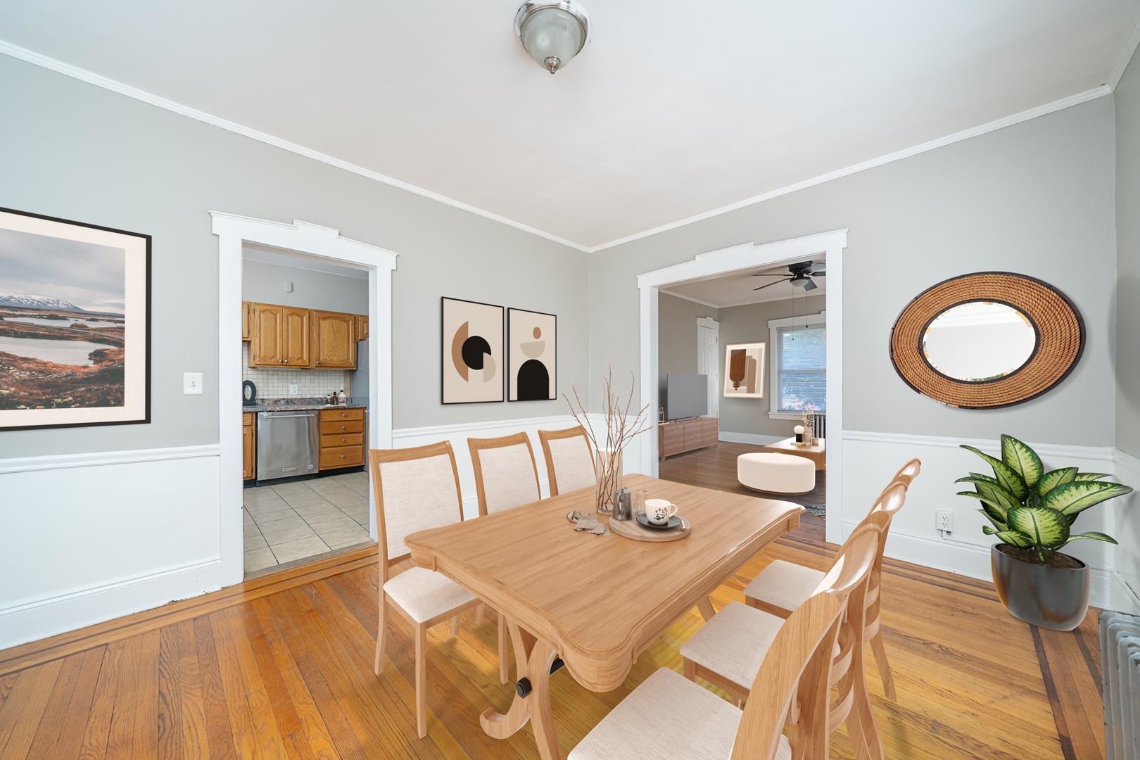 168 West Passaic Street, Unit 2 Maywood, NJ 07607 - Photo 2 of 22 a view of a dining room with furniture and a potted plant