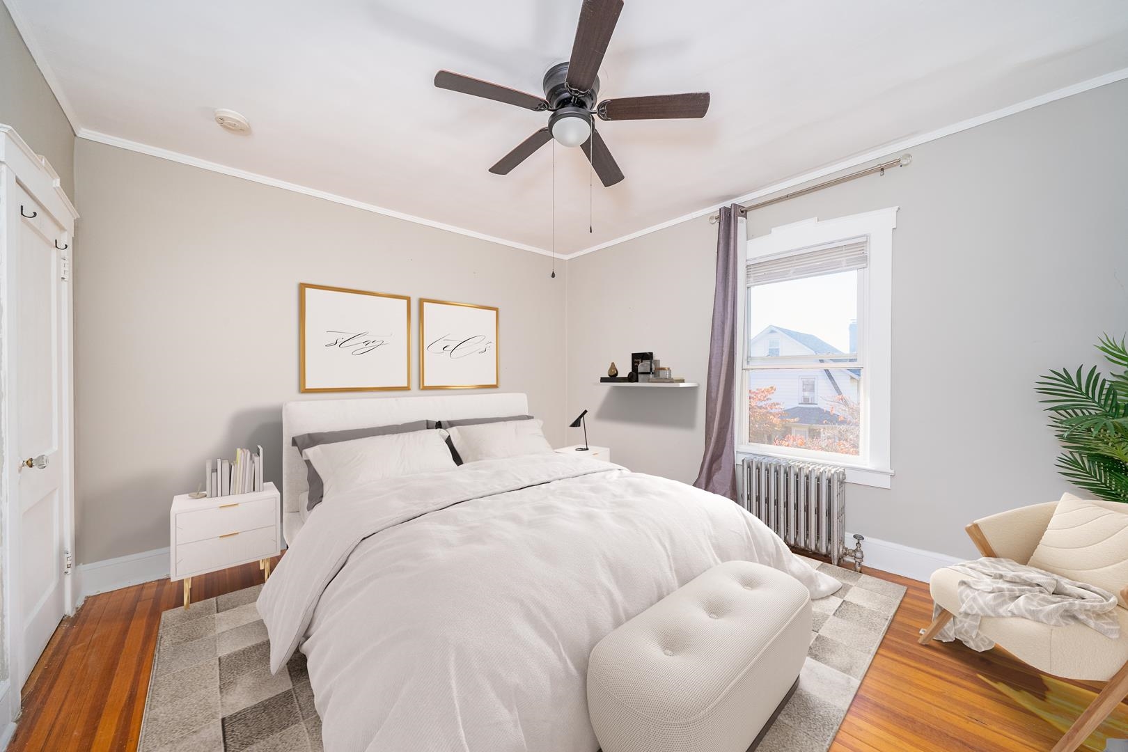 168 West Passaic Street, Unit 2 Maywood, NJ 07607 - Photo 7 of 22 a bedroom with a bed and a window