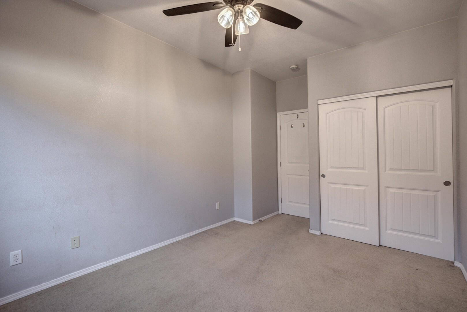 334 East Cedar Mill Road Star Valley, AZ 85541 - Photo 19 of 32 an empty room with a chandelier fan