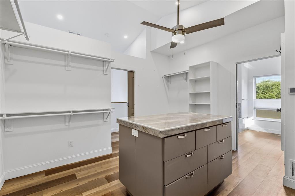 4436 Thunder Road Dallas, TX 75244 - Photo 17 of 33 Wood-finish flooring, vaulted ceiling, and recessed lighting