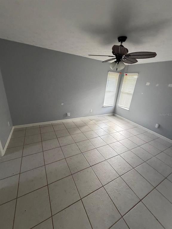 120 Southwest Bedford Road Port St. Lucie, FL 34953 - Photo 22 of 50 a view of an empty room and a window