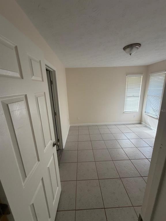 120 Southwest Bedford Road Port St. Lucie, FL 34953 - Photo 24 of 50 a view of an empty room and a window