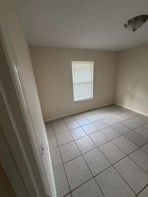 120 Southwest Bedford Road Port St. Lucie, FL 34953 - Photo 25 of 50 a view of an empty room and a window