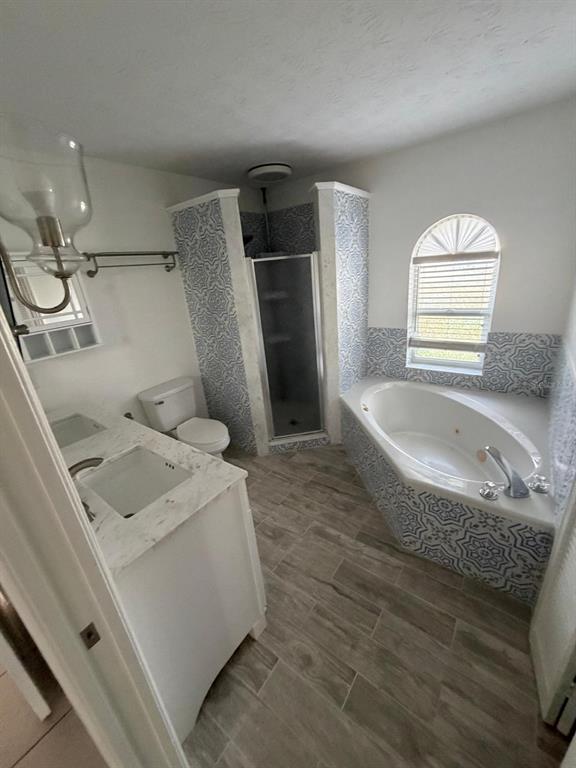 120 Southwest Bedford Road Port St. Lucie, FL 34953 - Photo 50 of 50 a bathroom with a sink a toilet and bathtub